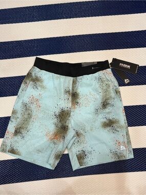RBX Men’s Light Blue Splash-Print Board Shorts with Black Waistband